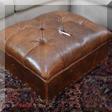 F07. Leather ottoman.